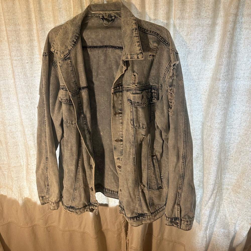 Distressed jean jacket